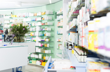 photo of the shelves with medicines - obrazy, fototapety, plakaty
