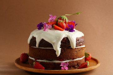 Cake with cream and fruits close-up