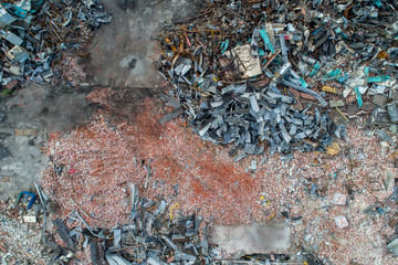 Piles of Twisted Scrap Metal and Bricks