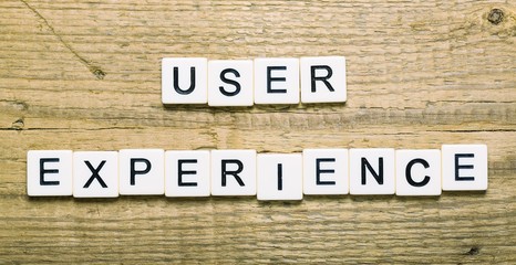 User experience sign with wooden cubes