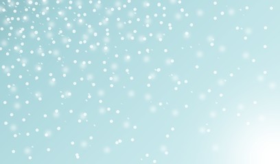 light blue background with light and snowflakes falling down