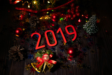 Red numbers 2019 among glitters