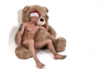 Young sexy santa and christmas. Present. 