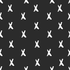 Seamless pattern with hand drawn x marks on black background.