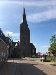 Fototapeta na wymiar The Sint Werenfriduskerk a church in Workum