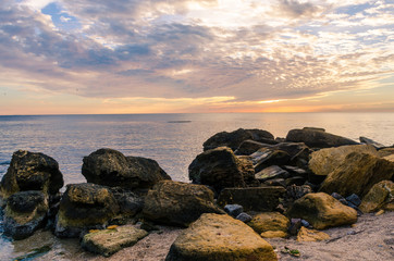 Fototapeta na wymiar Seascape in Odesa during the sunrise in the autumn season