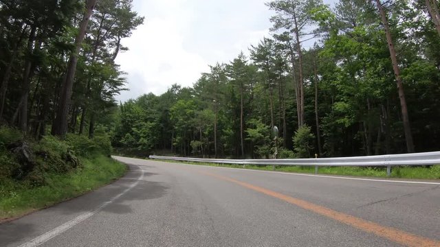4K POV point of view car driving through highway mountain in Japan