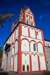 Collegiate Church of St. Bartholomew in Liege, Belgium, beautiful exterior side view against a clear blue October sky