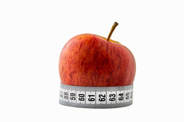 red apple and measuring tape.