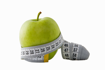 green apple and measuring tape.