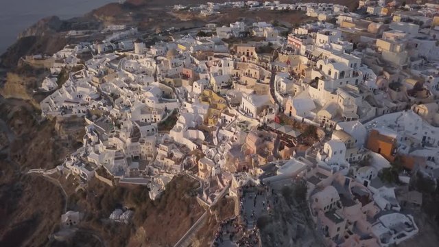 Beautiful town of Oia at sunset, aerial