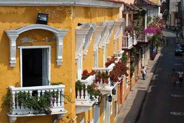 Fototapeta na wymiar Street and balcony in historic UNESCO district of Cartagena, Colombia