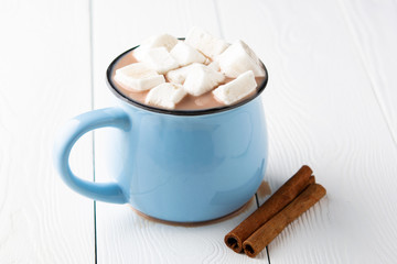red mug with hot cocoa or chocolate