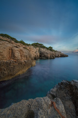 Fototapeta na wymiar Playa de Sant Tomàs, Menorca, Long Exposure 150 sec