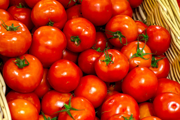 ripe tomatoes on the store shelf