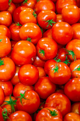 ripe tomatoes on the store shelf