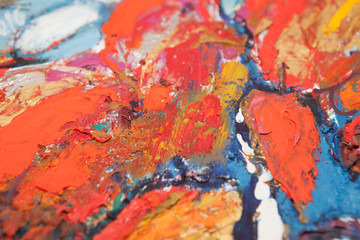 Background image of bright oil paint palette closeup