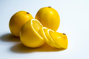 ripe lemon on white background