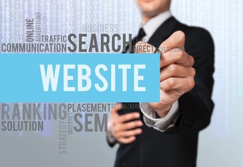 Businessman showing digital signs on background