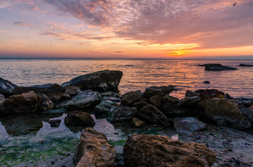 Fototapeta na wymiar Seascape in Odesa during the sunrise in the autumn season