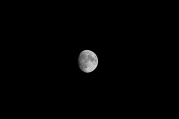 beautiful moon shining on black sky background