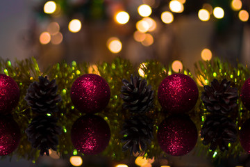 Fototapeta na wymiar Christmas background New Year. Bokeh background, blurry lights, christmas balls