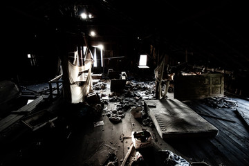 creepy abandoned attic with dirty mattress