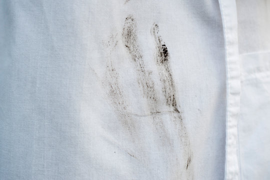 Dirty White Clothes. White Clothes That Need To Be Washed. Close Up White Dirty Shirt