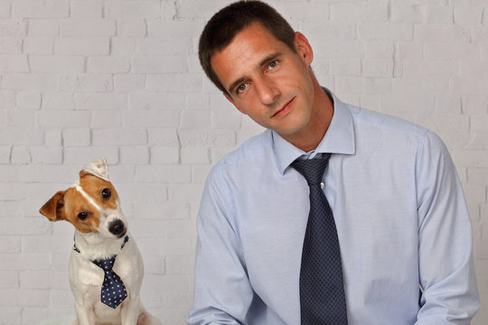 Funny Portrait Of Elegant Man And His Dog. Dog And Owner Matching Clothes