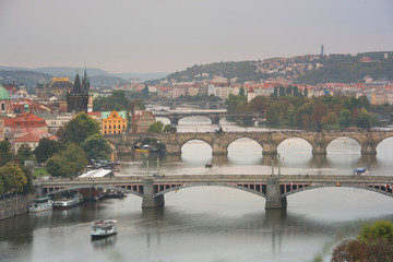 Fototapeta na wymiar Scenic spring sunset aerial view of the Old Town pier architecture and Charles Bridge over Vltava river in Prague, Czech Republic