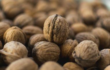 Fresh walnuts in shell. Selective focus