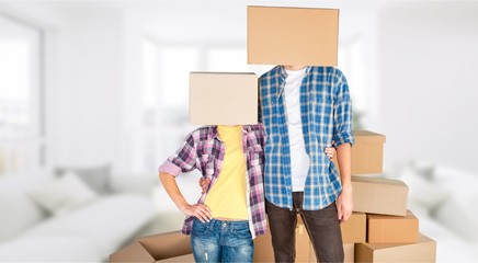 Couple with boxes on the head.