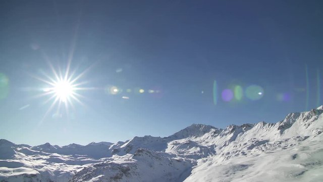 Tignes and Val D'Isere Footage Package, 4 clips from Tignes / Val D;Iser ski resort in France showing scenics views of the mountain, signage and ski pistes, 4K