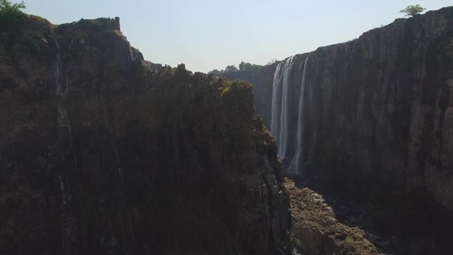 Aerial revealing shot of the canyon during dry season at Victoria Falls