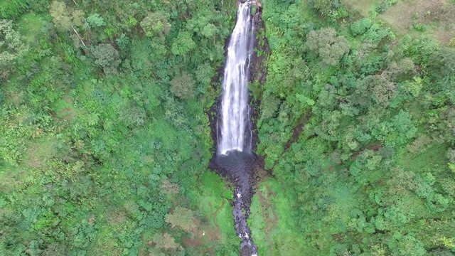 Straight down drone shot of the big Materuni waterfall at Kilimanjaro Mountain in Tanzania