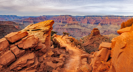 Panoramic landscape view of Grand canyon with person for scale, USA