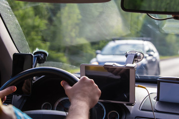 Driver in the car controls the navigator.
