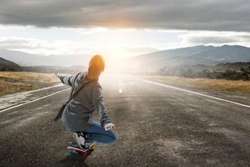 Teenager girl ride her skateboard. Mixed media