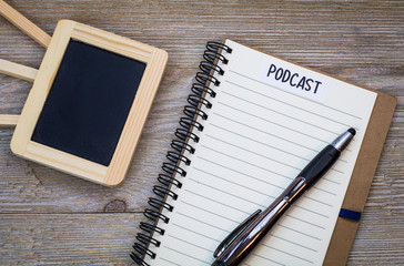 Podcast idea concept with notepad, flat lay
