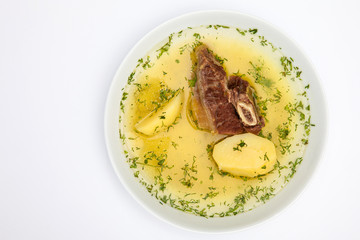 Traditional Colombian beef rib broth isolated on white background