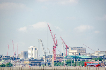 Construction tower crane against blue sky