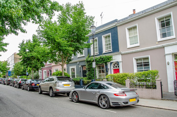 Notting Hill houses in the famous Portobello Road market, west London, United Kingdom.