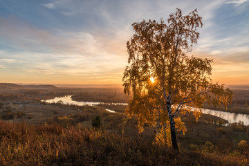 Autumn sunset over the river Irkut