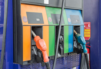 Colourful petrol pump in gas station. Gas station in a service.