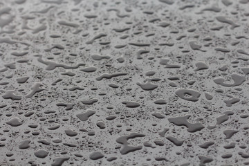 Water drops and splashes on black background