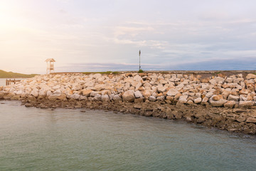 The wooden bridge in the sea