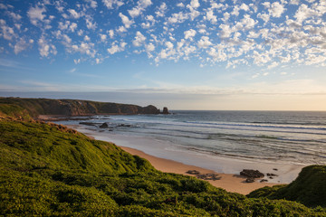 Cape Woolamai beach, looking towards the Pinnacles rock formation at sunset; Phillip Island,...