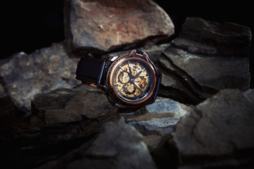luxury men's watches on the stones