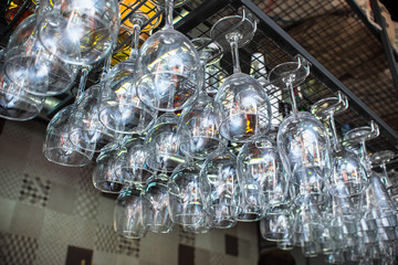 Glass glasses hung from the bar