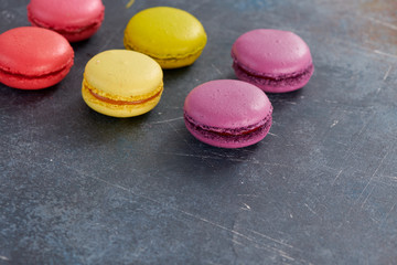 macaroons on a dark table